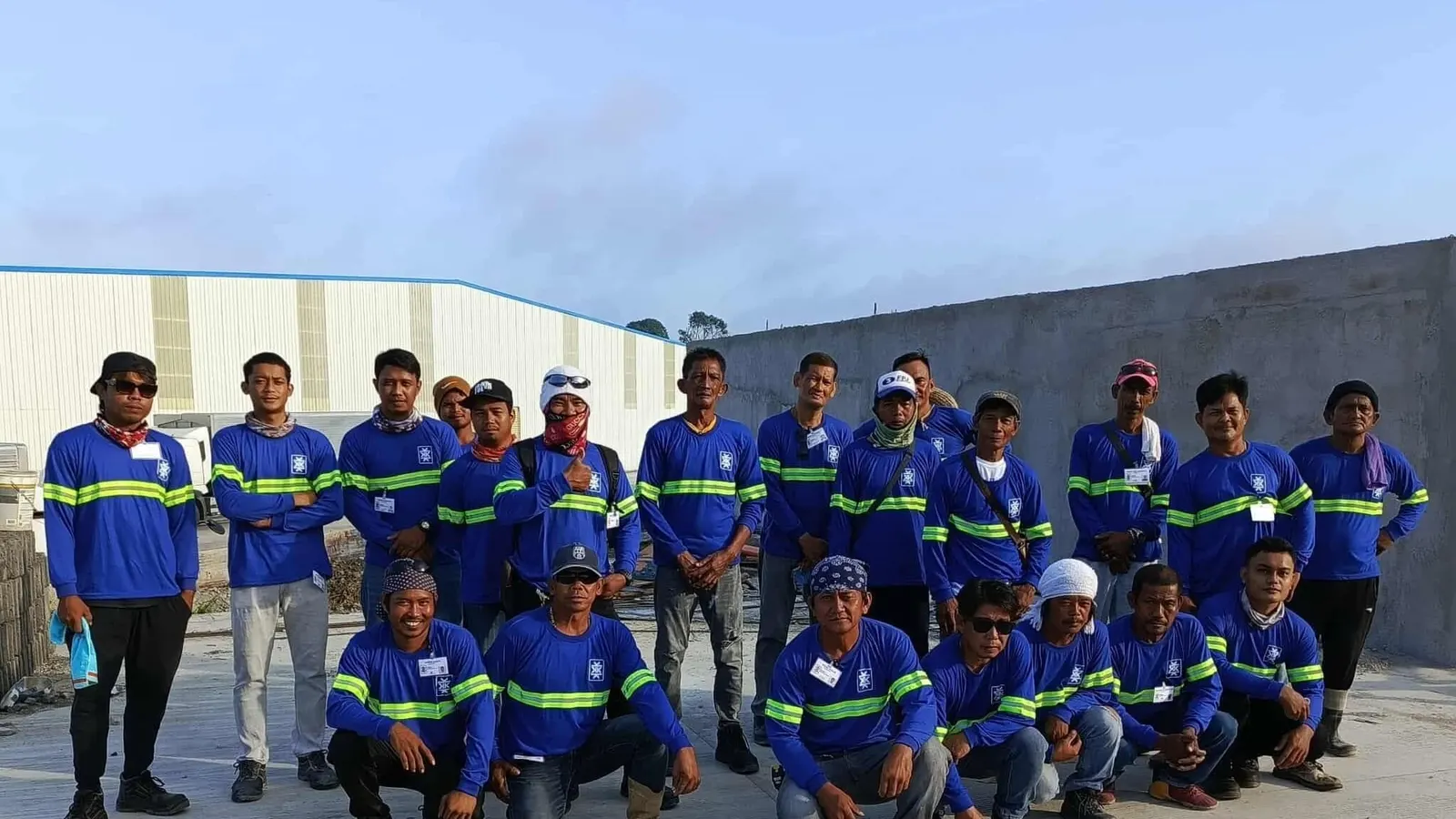 Kariken Construction crew in company shirts on site